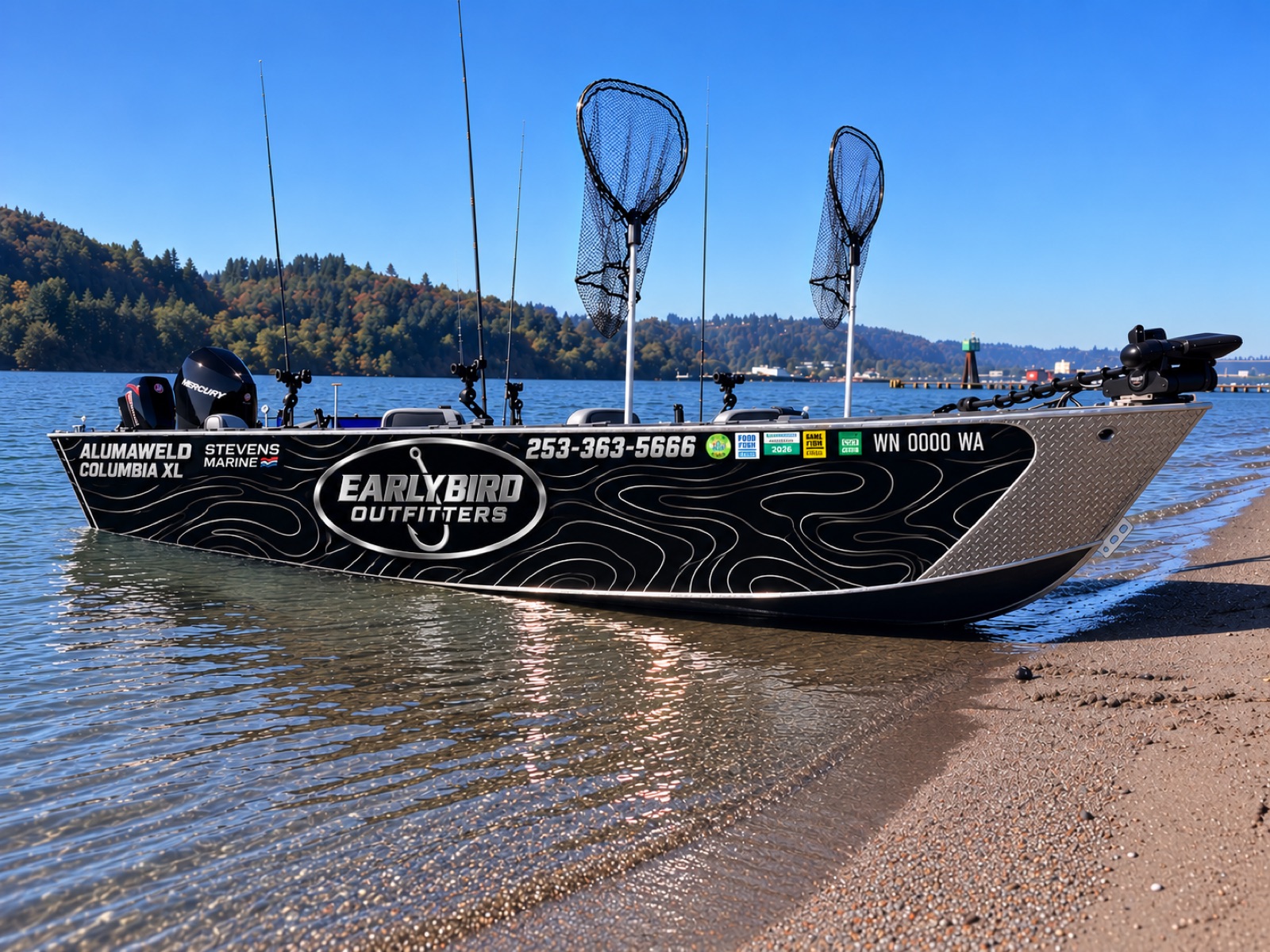 The Early Bird Outfitters jet sled beached on the shore of a Western Washington river
