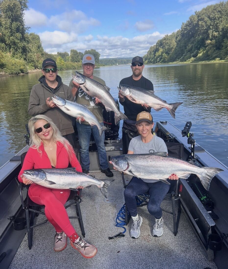 Group on the jet sled holding Columbia River king salmon